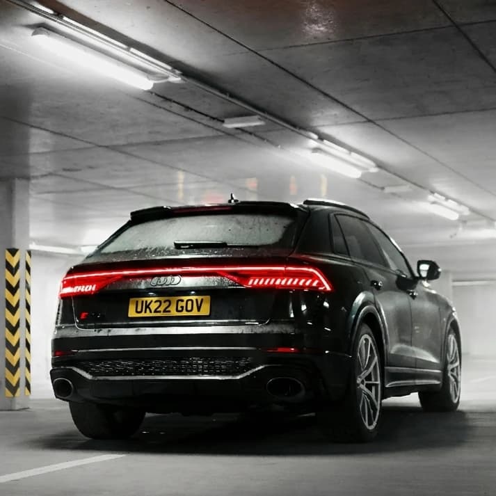 Photo of a metallic black Audi RS Q8 showing the private number plate UK22 GOV, which reads as UK GOV and is currently available for sale for £7,650.